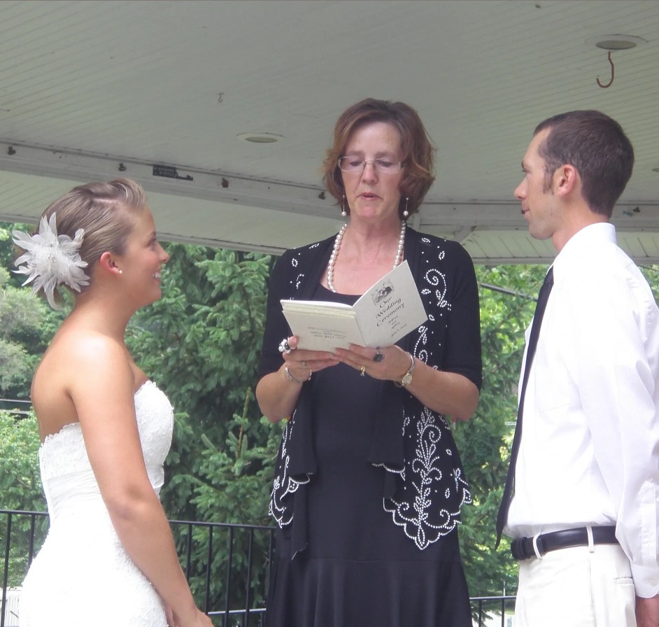 Rev. Ida-May Hanson officiating a wedding ceremony